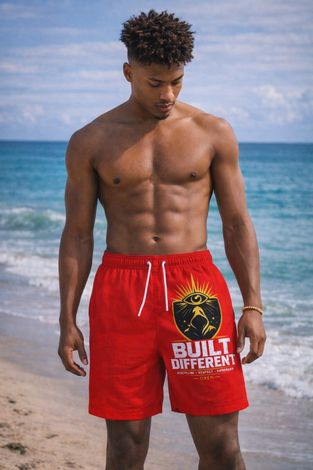 Built Different Swim Trunks – Red AOP Athletic Beach Shorts with Motivational Crest